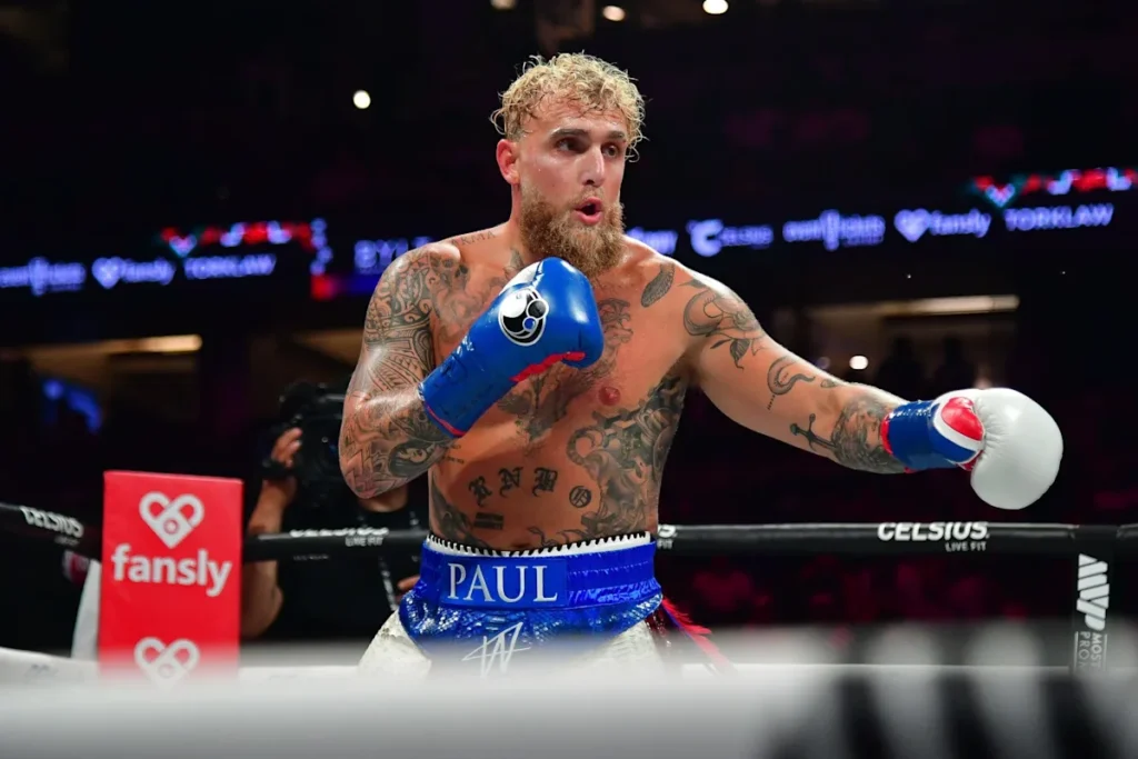  Jake Paul net worth 2026 — professional boxer Jake Paul fighting in the ring
